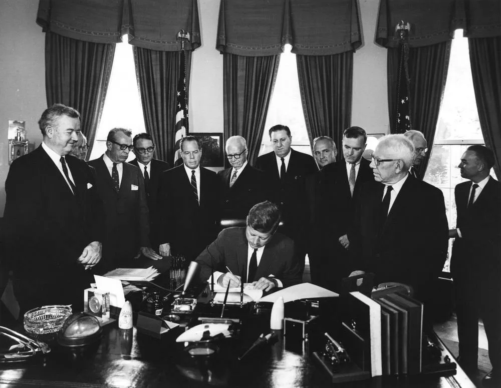 Kennedy signs an ammendment to FAA