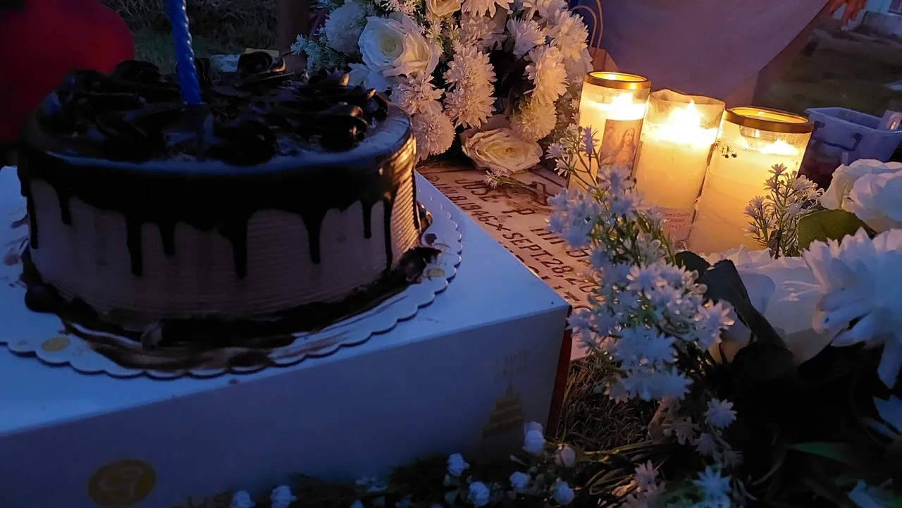 Visiting our Grandfather's grave on his Birthday