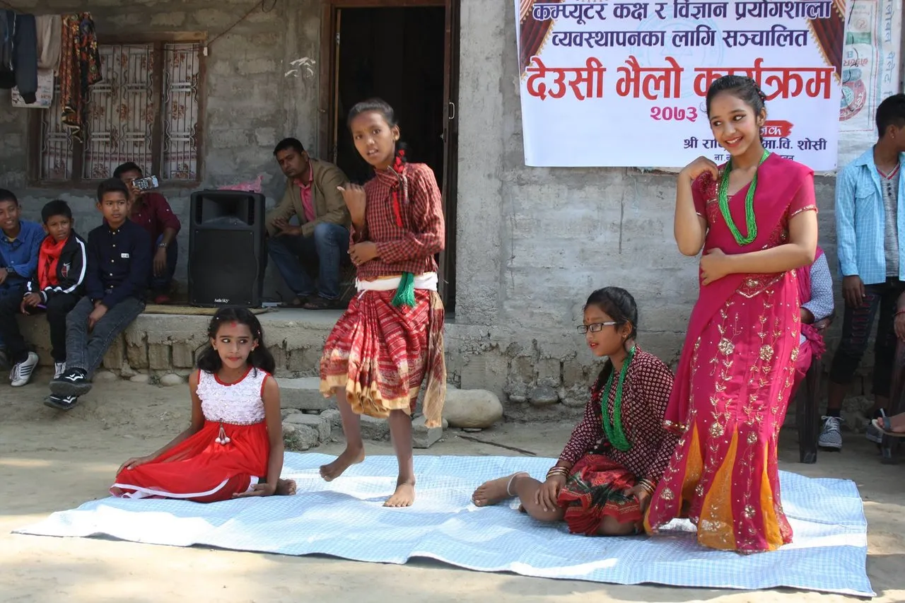 This girl on the right side is Akriti - Tara's daughter. Isn't she beautiful? They were performing to collect some donations for the construction of a new library.