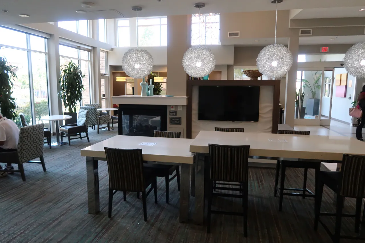 Lobby tables and TVs Residence Inn Marriott in Nashville SE:Murfreesboro, Tennessee!.JPG