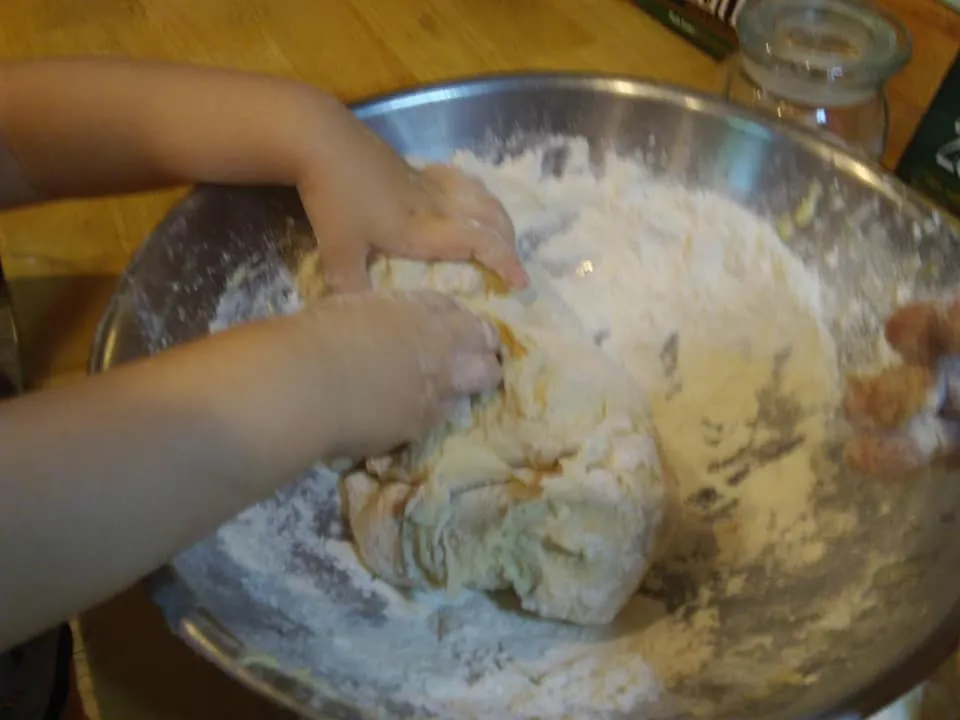 bread naan 6 working in the flour hand kneading.jpg