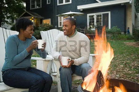 49784836-couple-by-bonfire.jpg