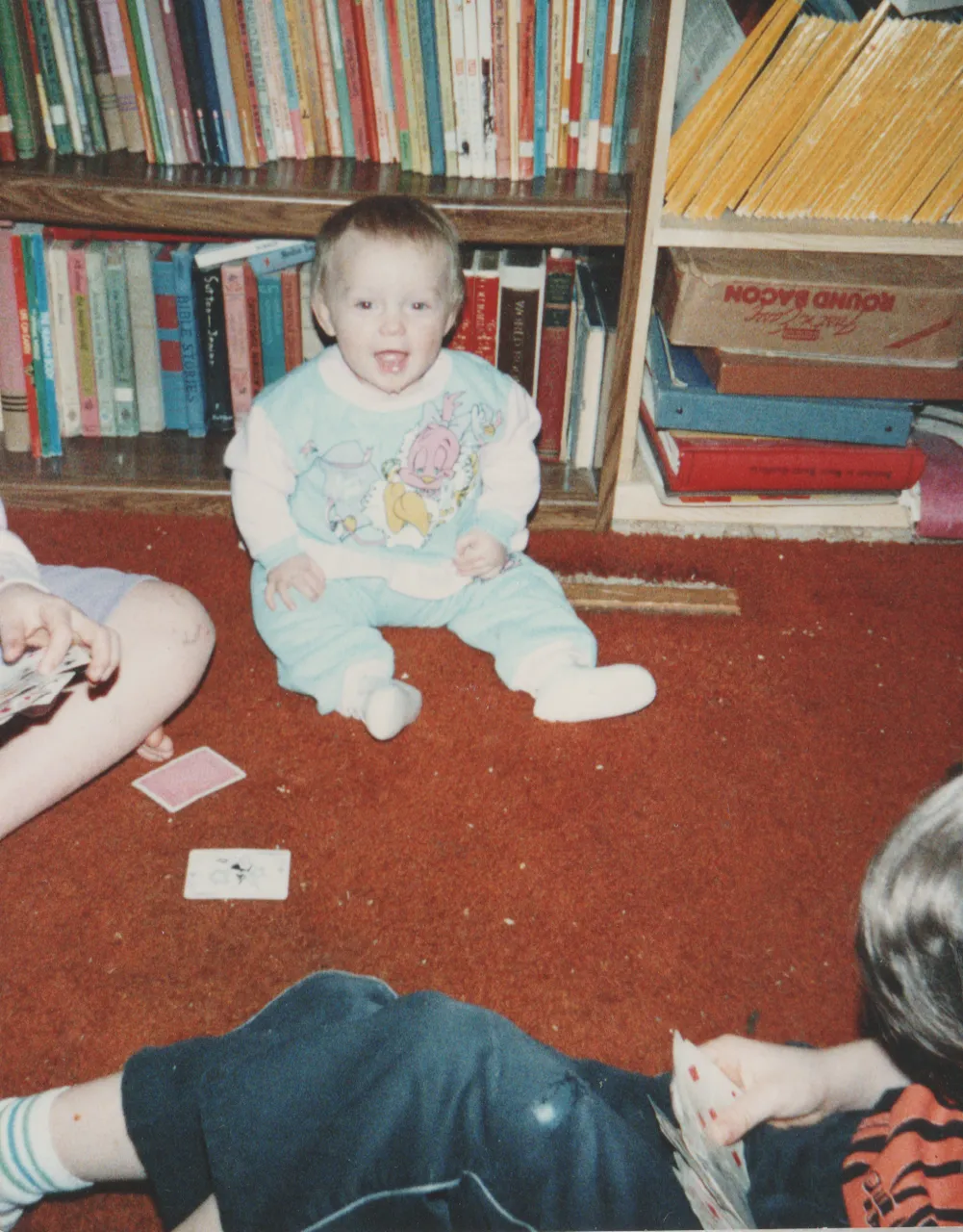 1991-12-31 - Tuesday - Joey on a bike, Crystal playing cards, Rick, Katie, New Years Eve-2.png