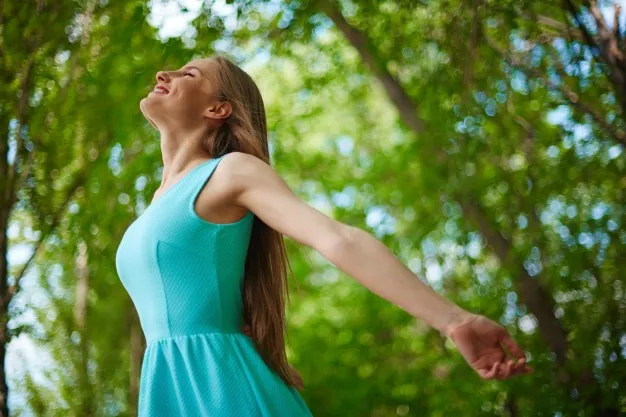 happy-woman-enjoying-nature_1098-1635.jpg