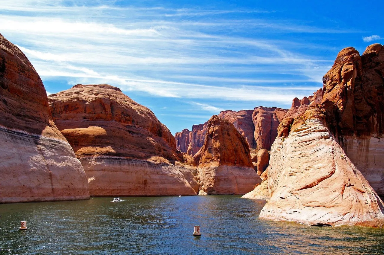 lake-powell-eroded-rocks-red-blue-sky.jpg