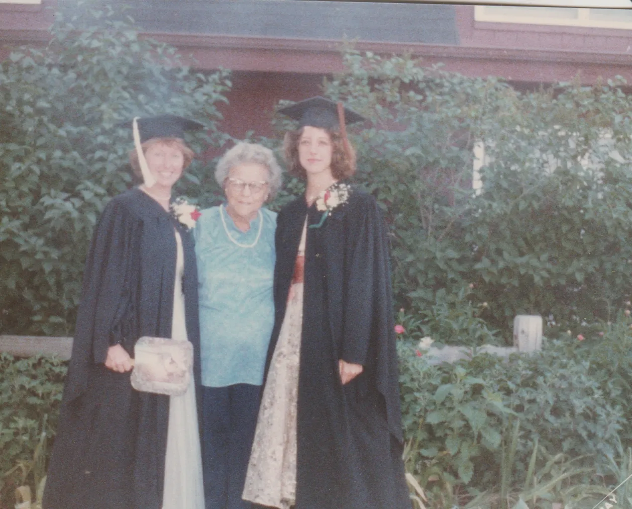 1985-05 - Ann with Connie and her friend, Laura, at their graduation.jpg