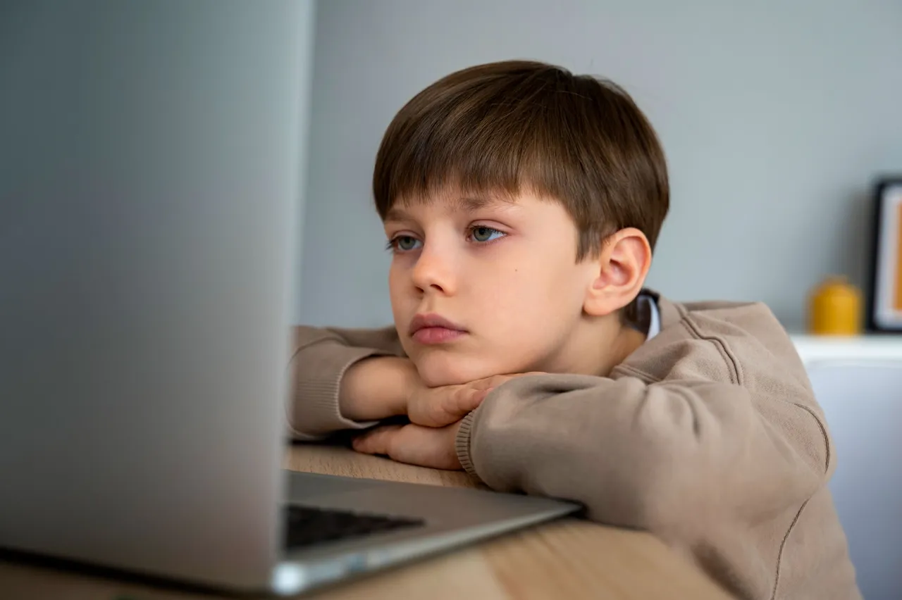 little-boy-watching-films-laptop.jpg