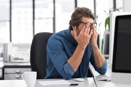 58217498-portrait-of-an-upset-businessman-at-desk-in-office-businessman-being-depressed-by-working-in-office-.jpg