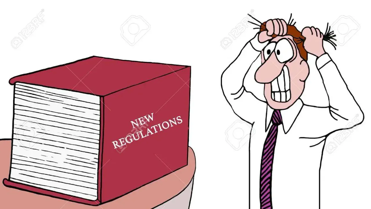 73596441-cartoon-of-a-businessman-pulling-his-hair-out-as-he-sees-a-huge-book-of-new-regulations.webp