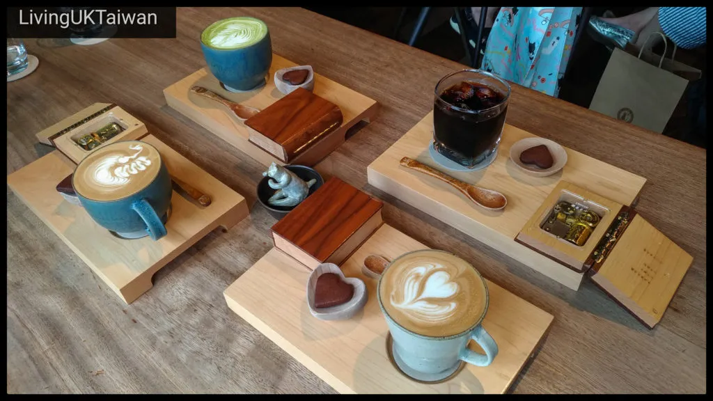 Four cups of coffee on a tray