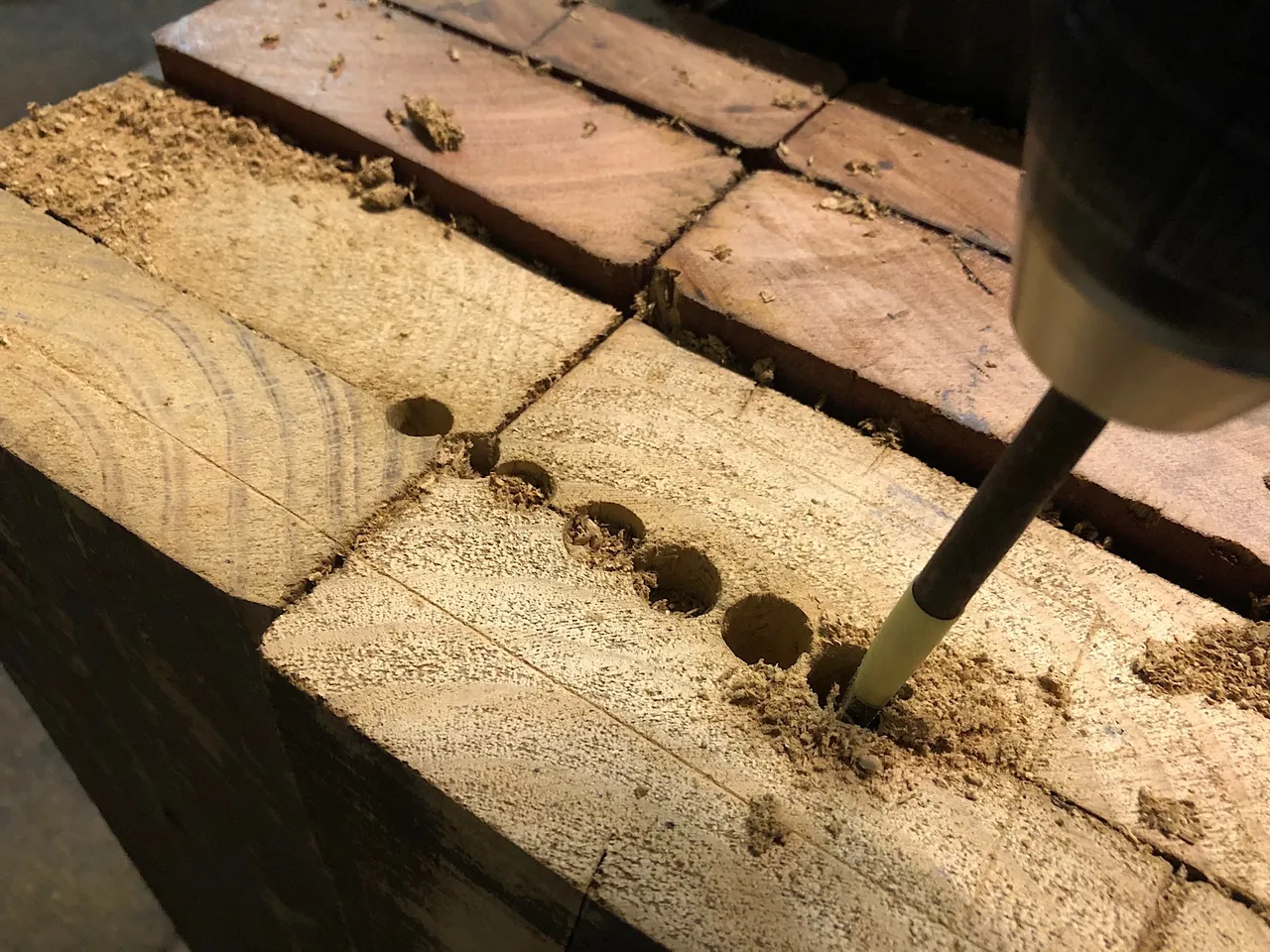 Drilling hole for in a wooden anvil stand