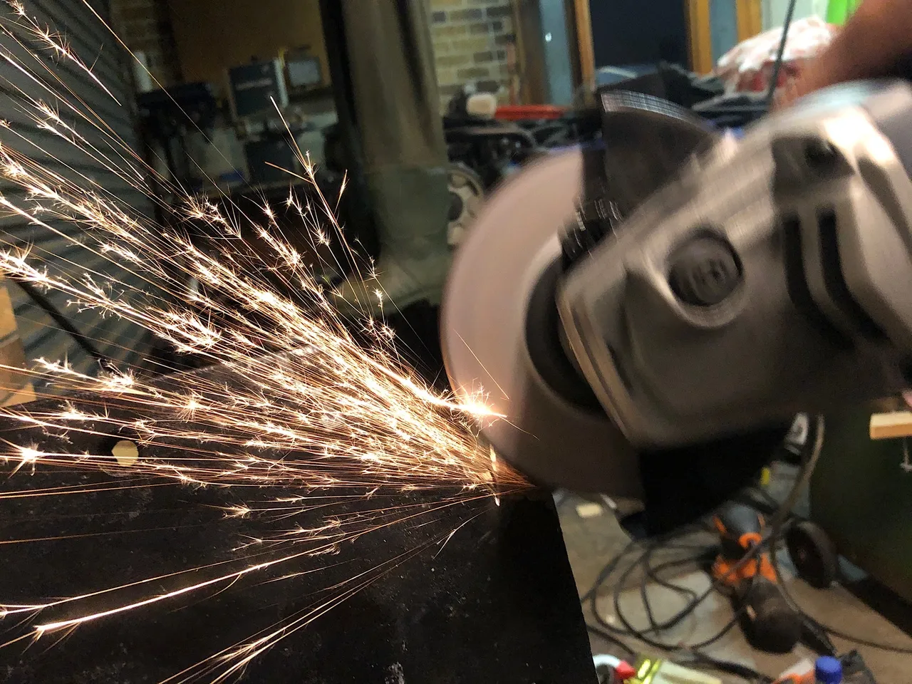 Finishing the cut with an angle grinder