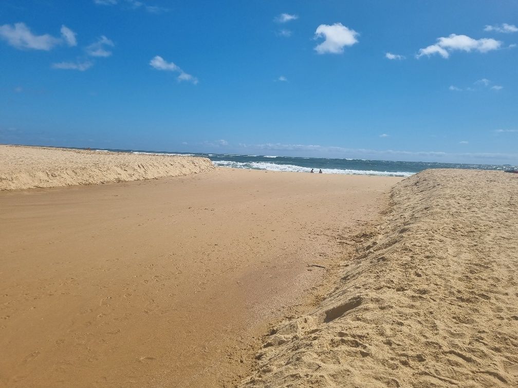 Tooway Creek and Lake empties into the ocean cutting its own path when they get a lot of rain or maybe it fills up on high tide and empties again on low tide.