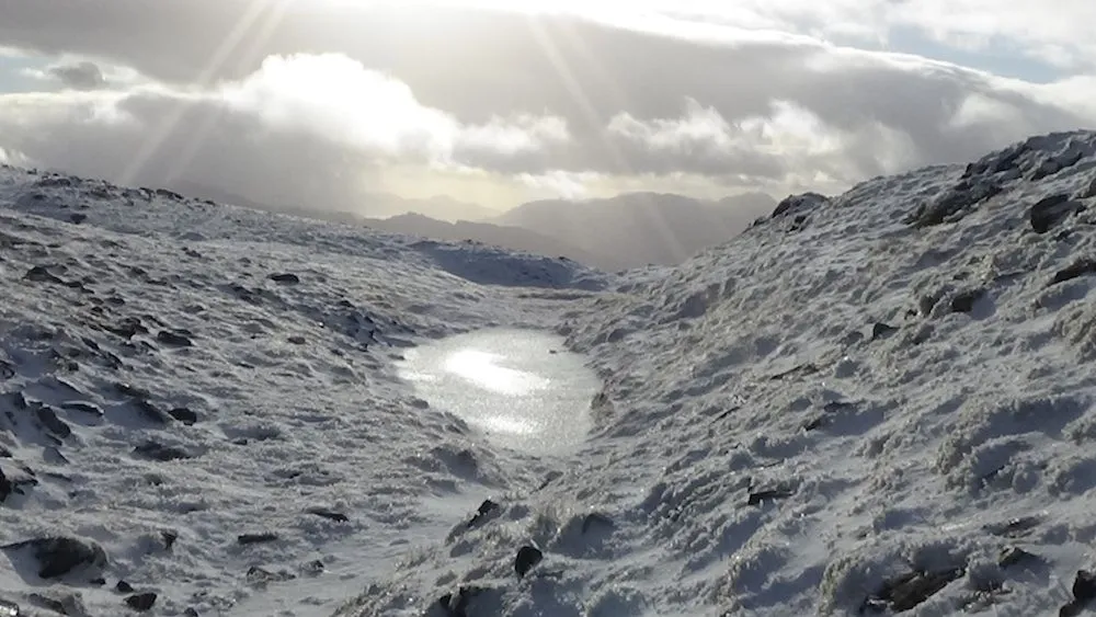 46 Gorgeous ice pool and golden shades closer.jpg