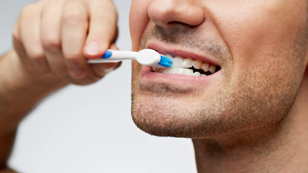 man-brushing-teeth.jpg