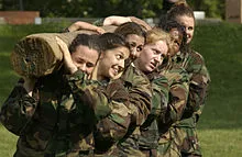 US_Navy_040518-N-9693M-015_A_squad_of_Midshipmen_work_with_a_log_as_part_of_teamwork_training_during_Sea_Trials.jpg