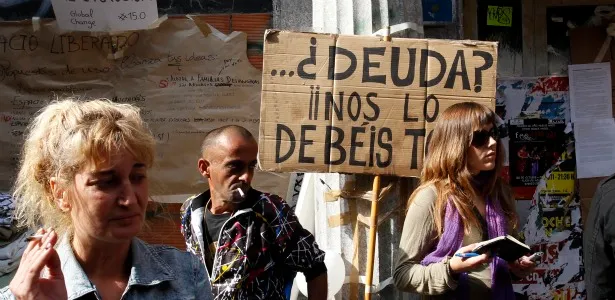 615-spanish-debt-sign-ows.jpg