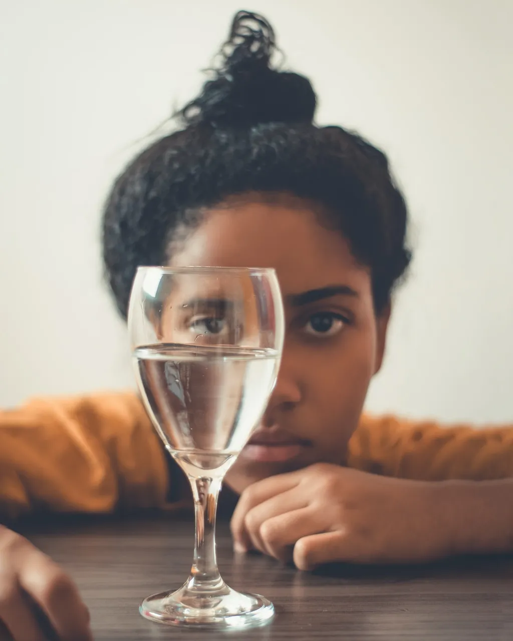 womanstaringonglassbottle18441551.jpg