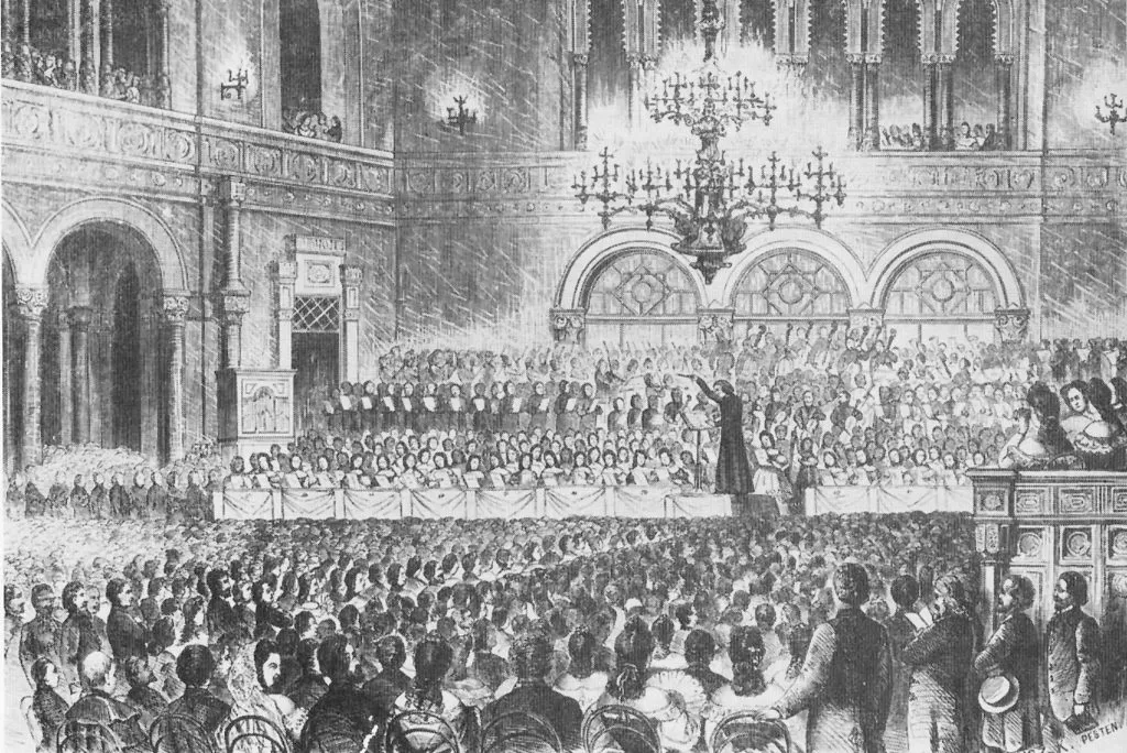 Ferenc Liszt's fundraising concert for the flood victims of Pest, where he was the conductor of the orchestra, Vigadó Concert Hall, Pest, Hungary 1839. Photo Source - Wikipedia