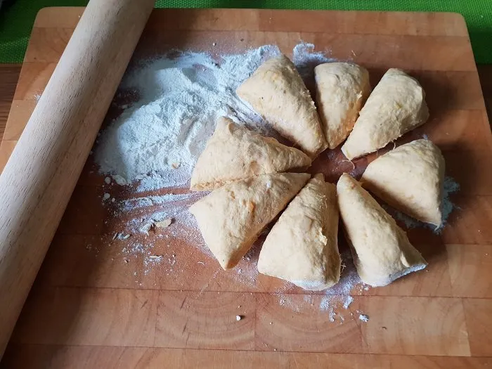 cutting the dough into 8 parts