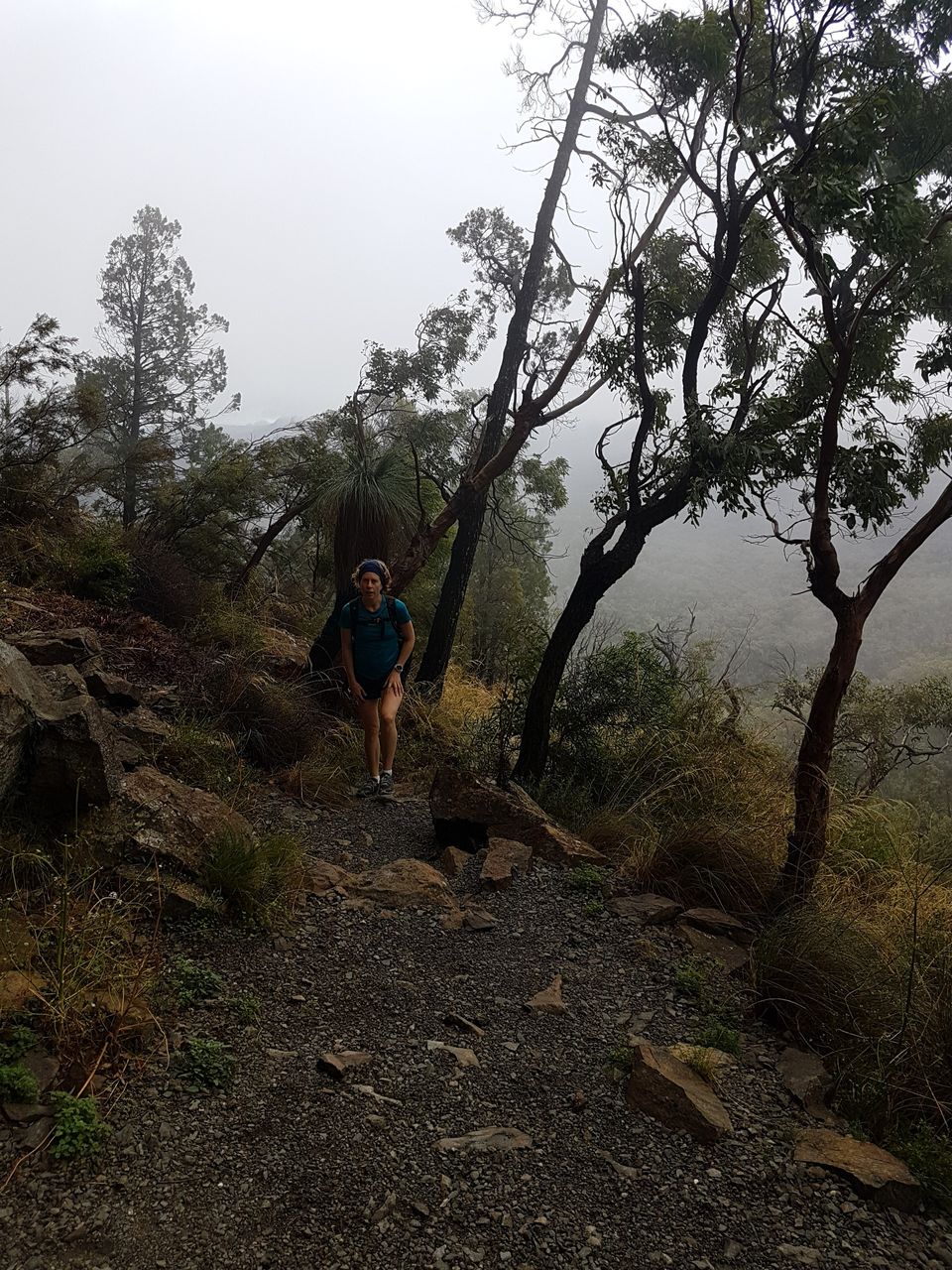 Caroline with her hands on her legs, indicating that it was tough work getting up these hills.