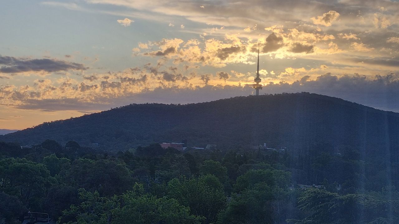 The sunset behind Black mountain and the communications tower. We would happily stay at the Rex Hotel again and maybe check out the spa suit next time.