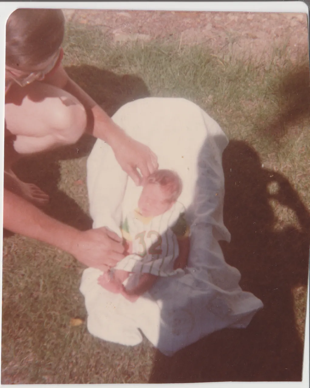 1980-07-05 Saturday Katie 12 days old Don Marilyn Crib Outside Grass.png