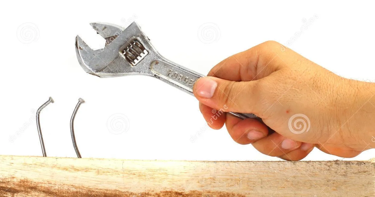 Image of hammering with a wwrench