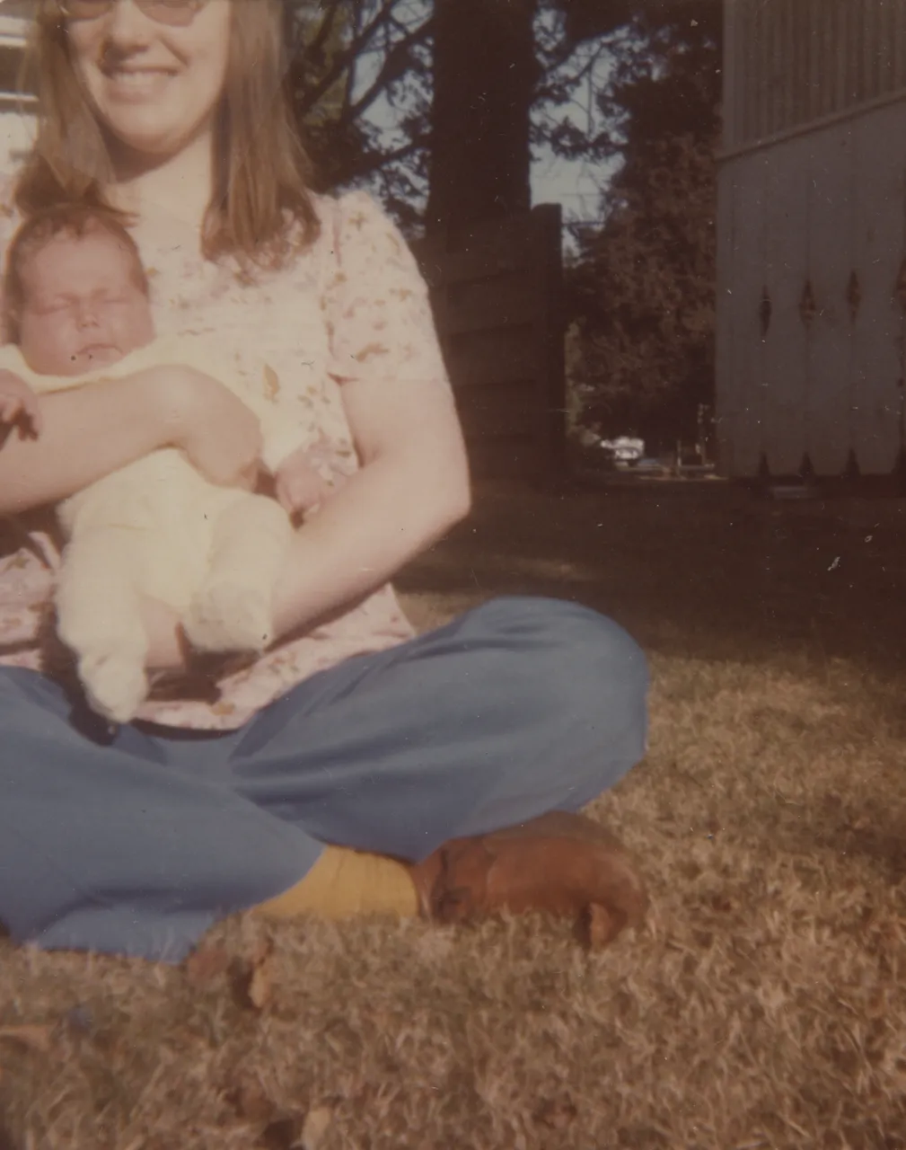 1980 Katie Mom Holding Her on Grass.png