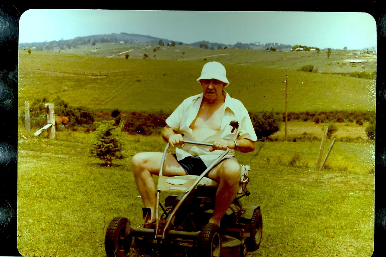 GRANPA MOWING LAWN.JPG