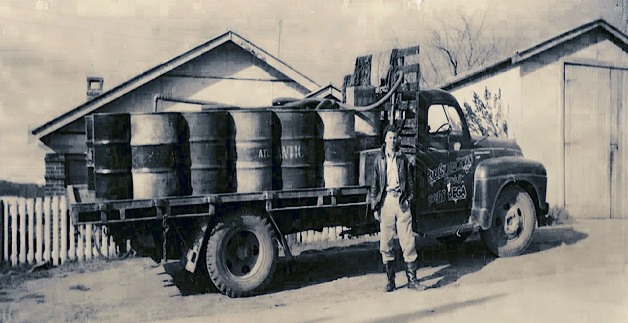 DAD WITH THE OLD FUEL TRUCK.png