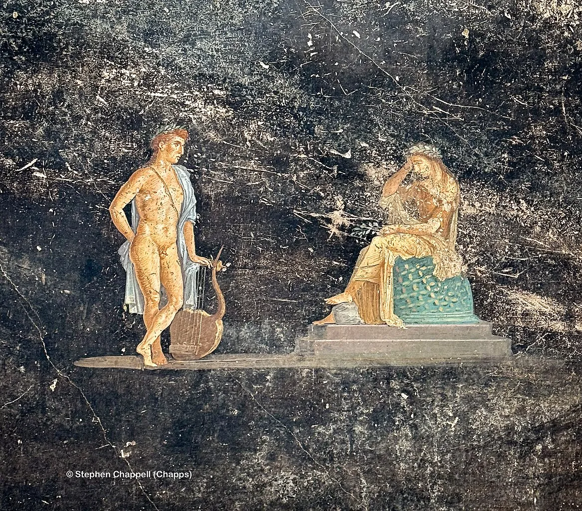 Fresco of Apollo and Cassandra from the newly excavated Black Room, Pompeii. Chappsnet, CC BY-SA 4.0, via Wikimedia Commons.