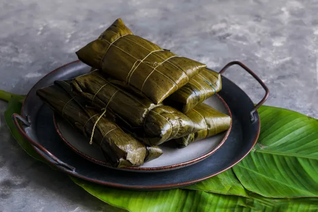 venezuelan-christmas-food-hallacas-tamales_103019-803.jpg