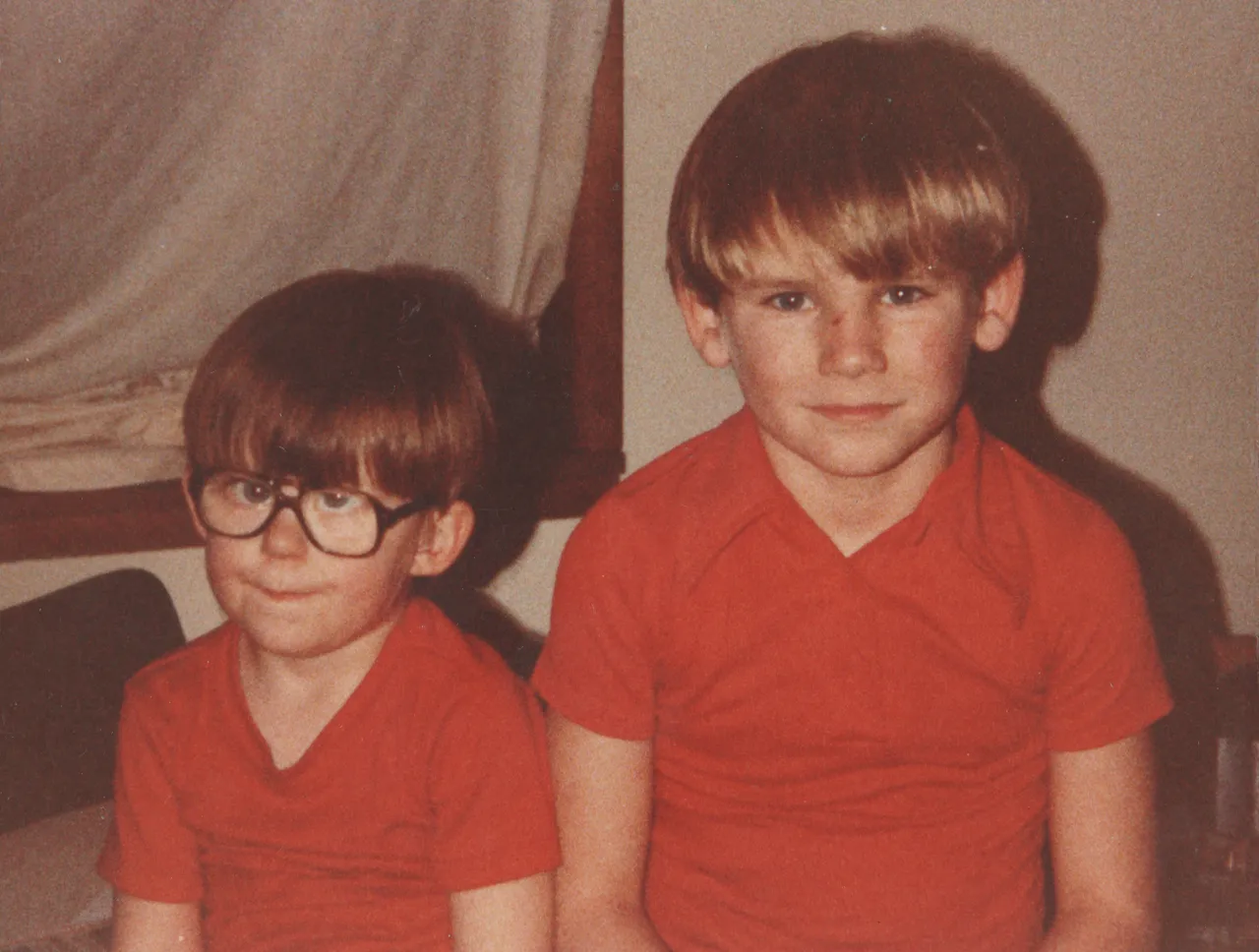 1970's maybe of two boys in orange red.png