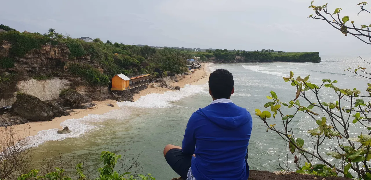 Watching the waves hit the shore of the Balangan beach is something you can do in Uluwatu if you prefer to relax
