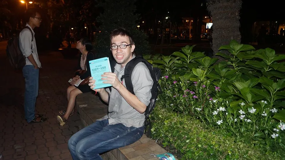 2015-06-30 - Tuesday - 10:00 PM - Oatmeal Joey holding a Vietnamese English Dictionary at that 23 9 Park.jpg