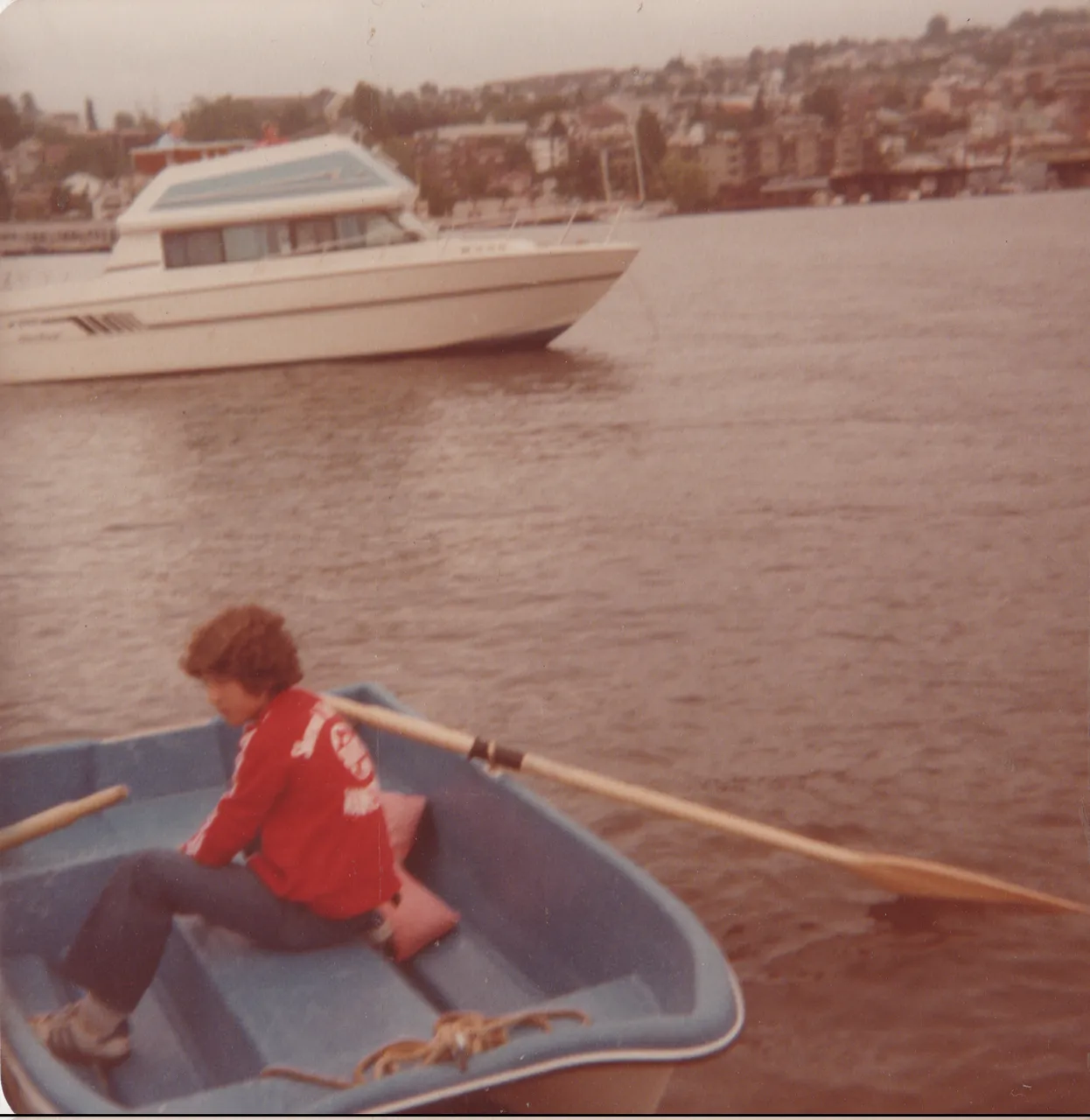 1980s - Red jacket boy on a boat, maybe 1980s.png