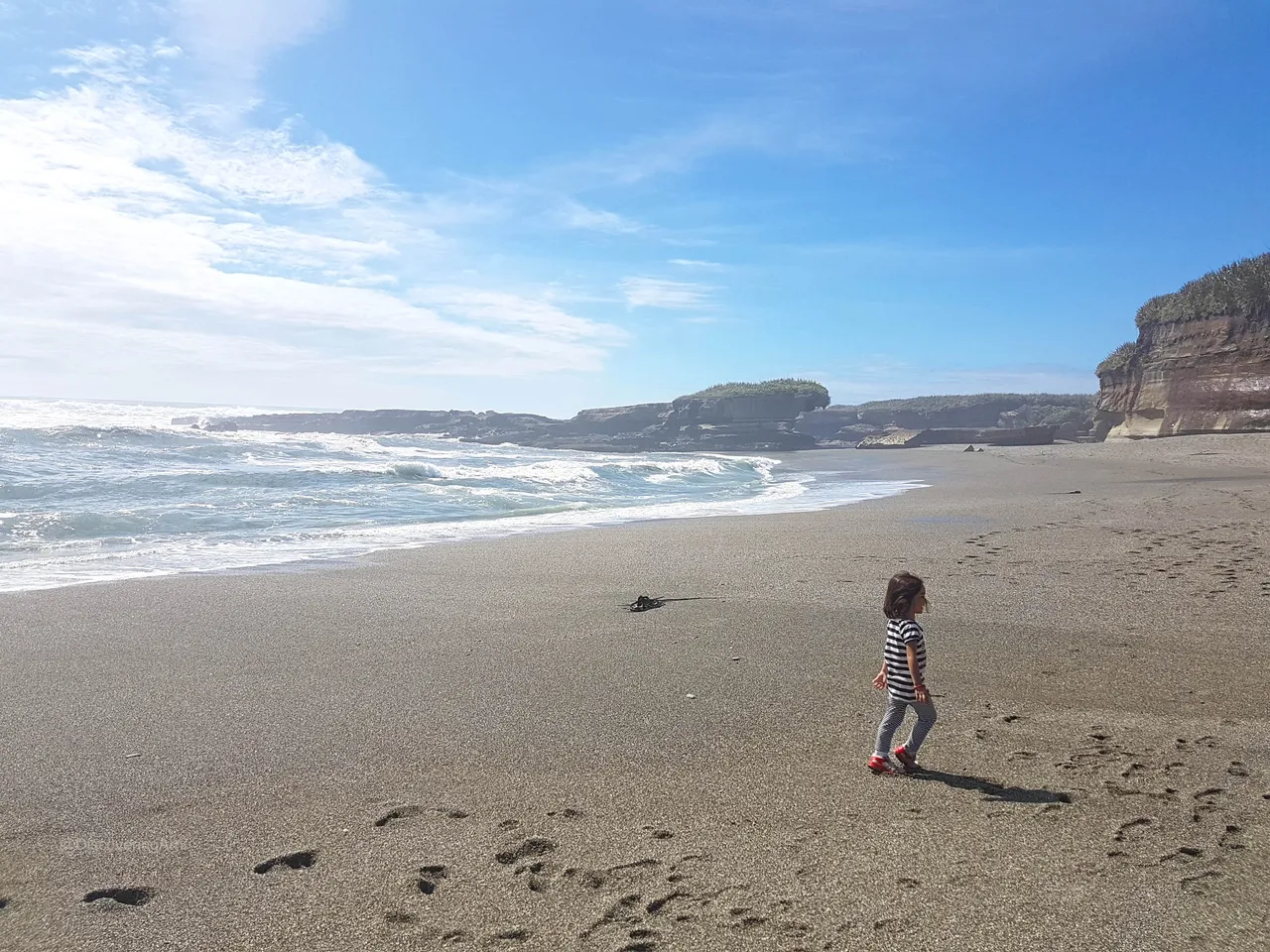 Running around the muddy gravel shores