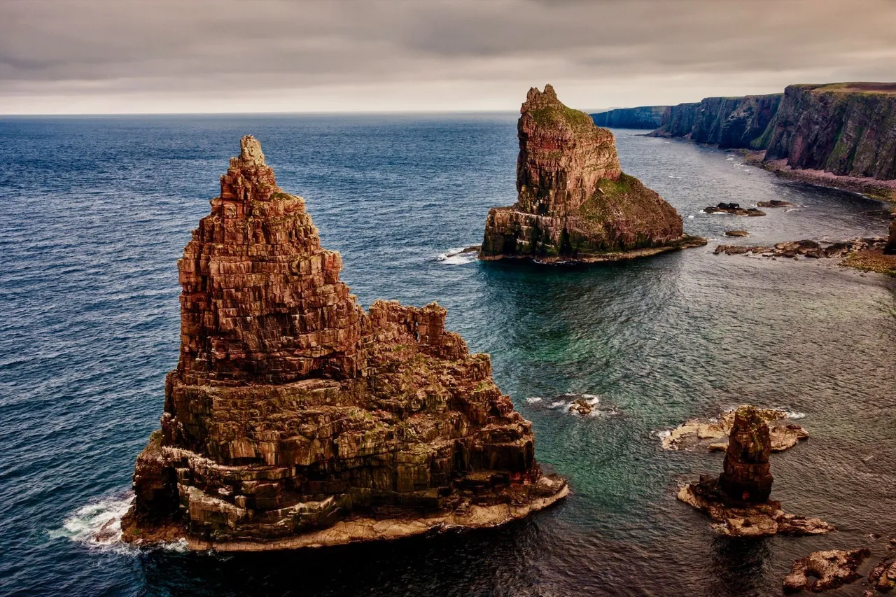 rocks-at-sea-dark-sky.jpg