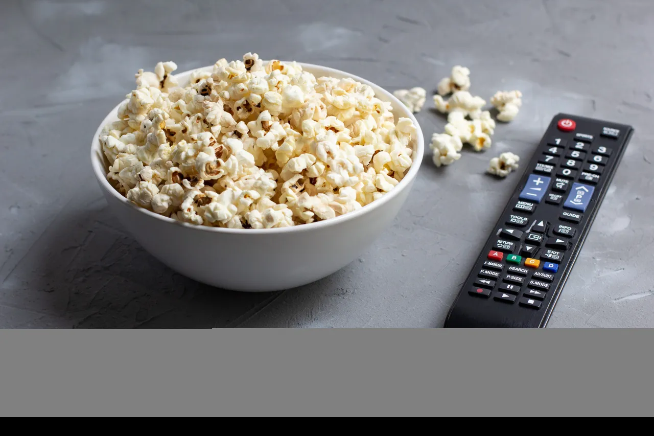 " " \" \" \\" \\"a-white-bowl-of-popcorn-and-tv-remote-on-a-grey-ba-2023-01-16-19-30-09-utc.jpg\\"\\"\"\"""